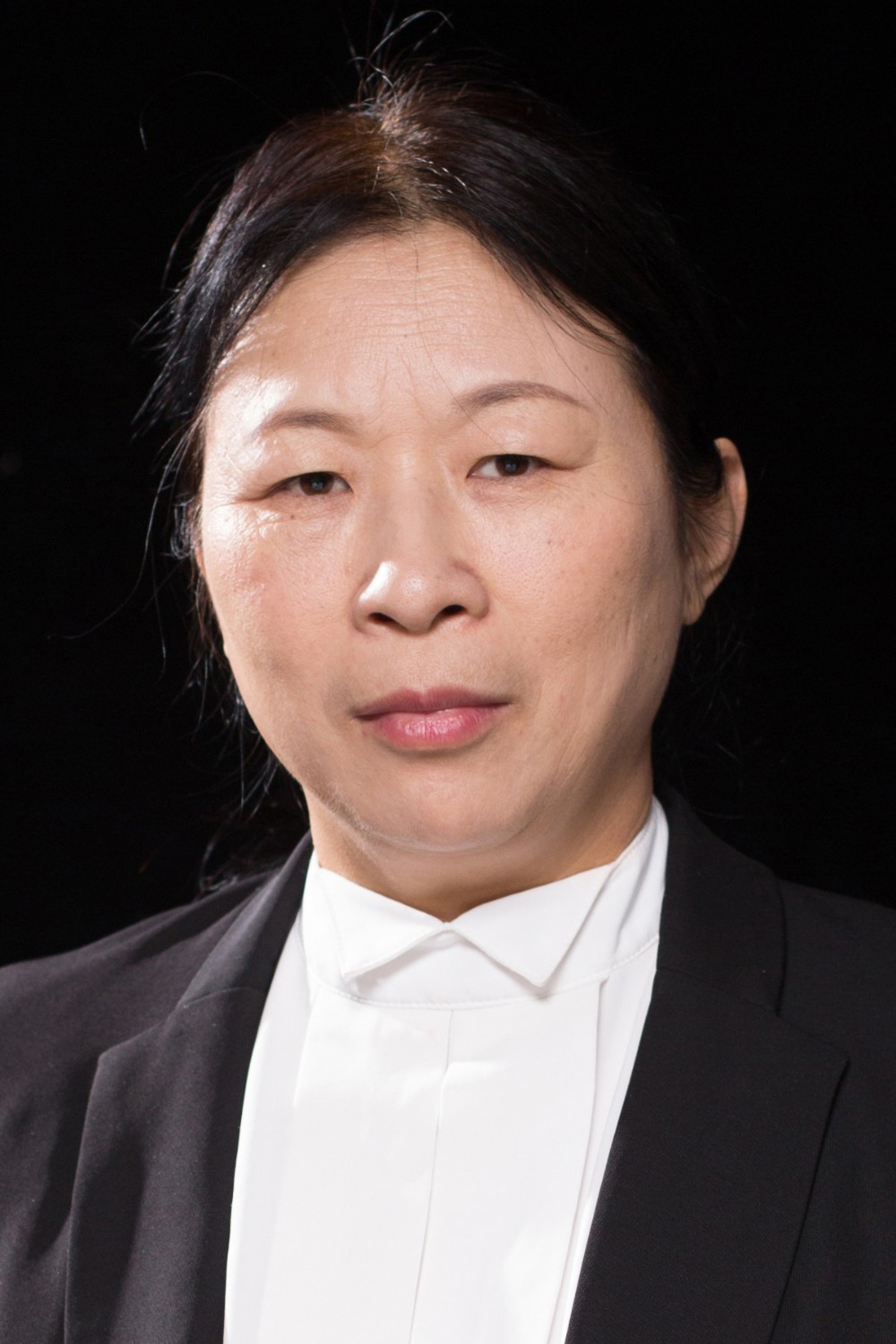 李华